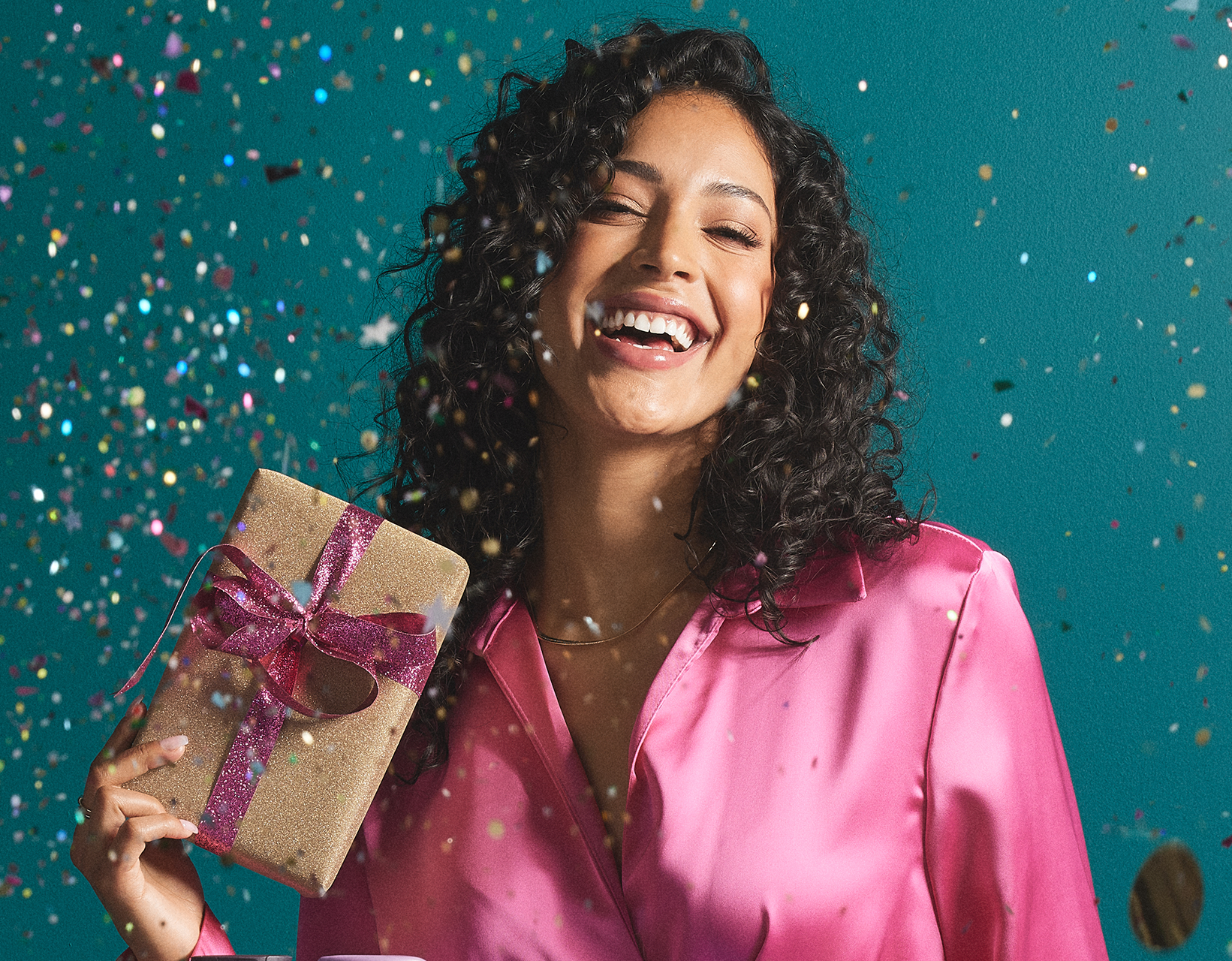 Model holding a present