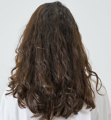 how to tame frizzy hair